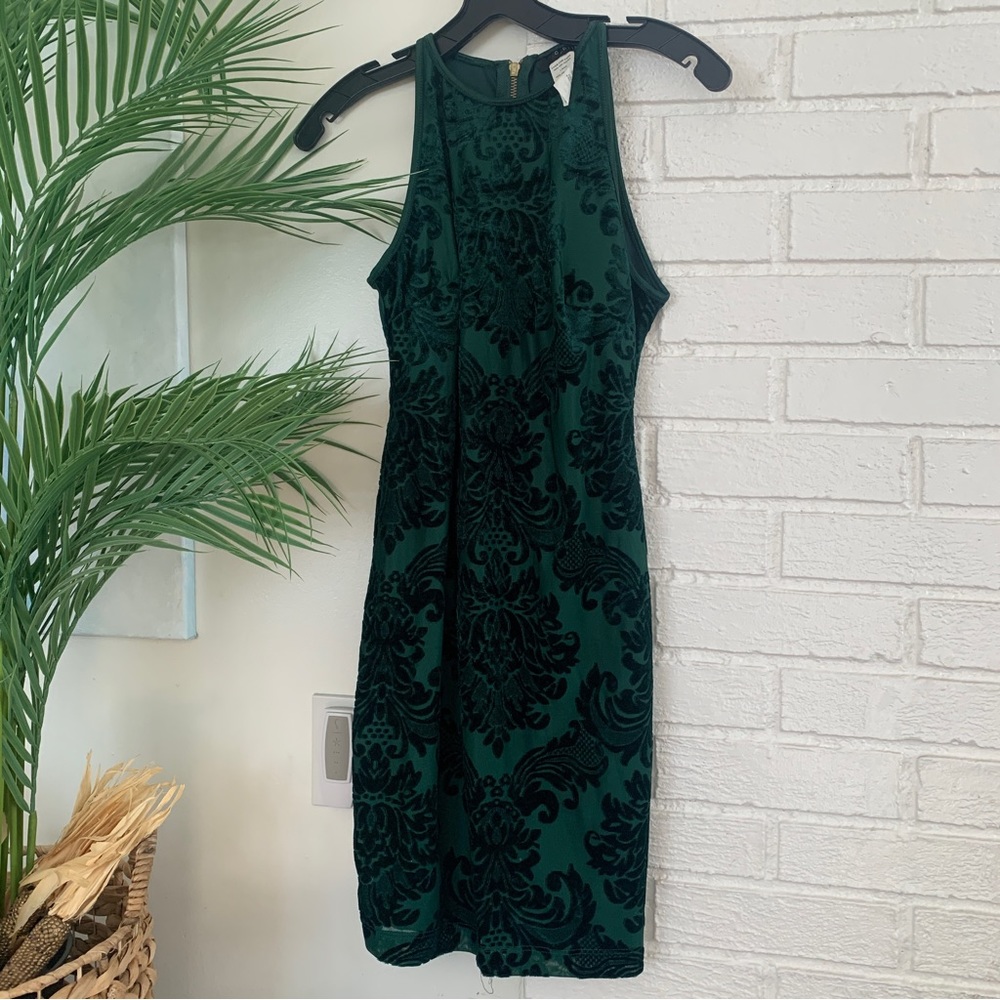 slim fit dress slacks B Darlin Womens Green Stretch Sequined Textured Crisscross Bungee Strap Lined Cowl Neck Short Party Fit + Flare Dress main image 1
